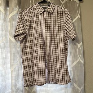 Orange black white and blue man’s short sleeve buttoned down shirt